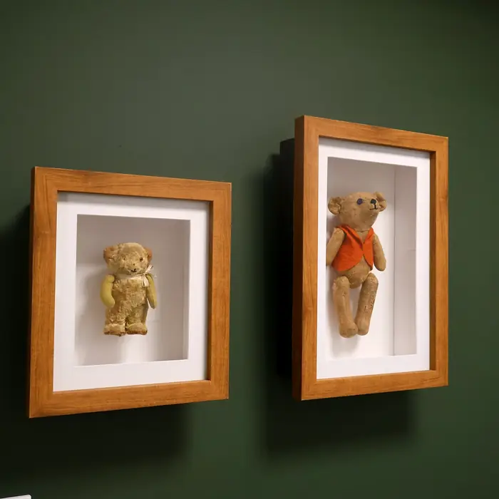 Close view of framed vintage teddy bears
